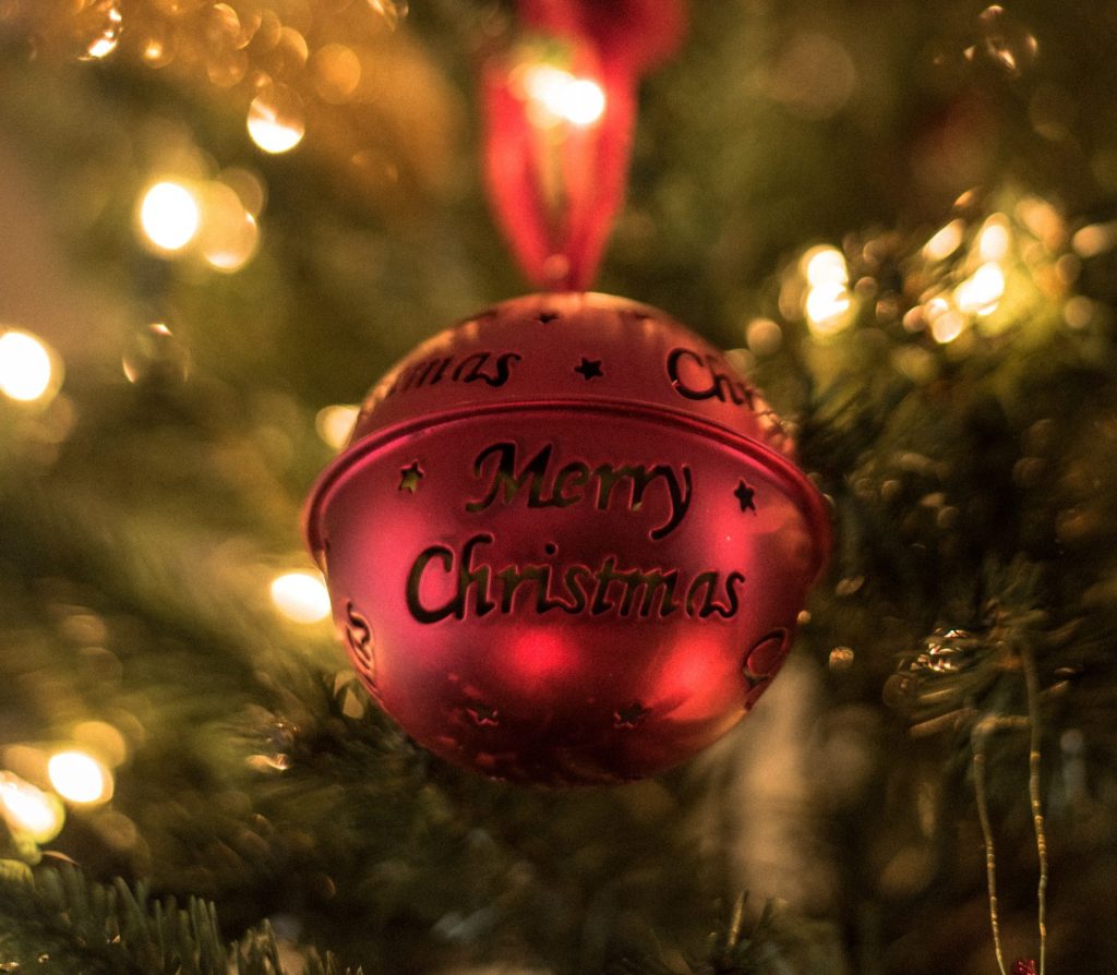 red Christmas bell on Christmas tree